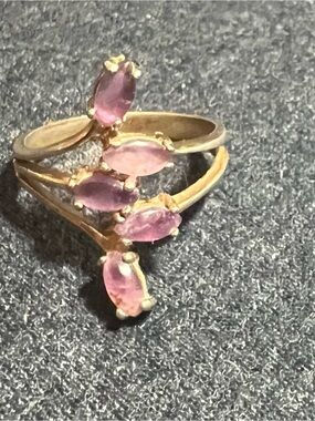 Vintage gold colored ring with pink amethyst stones. Gorgeous!
